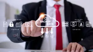 Business professional interacting with a cloud-based digital signage security system, highlighting data backup, encryption, and network protection.