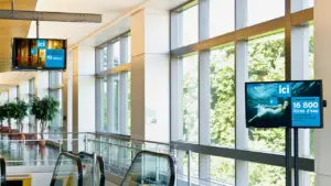 Digital educational signage on a college campus displaying schedules, event updates, and wayfinding information for students.