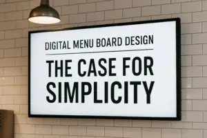Digital menu board on tiled wall with the message “The Case for Simplicity”